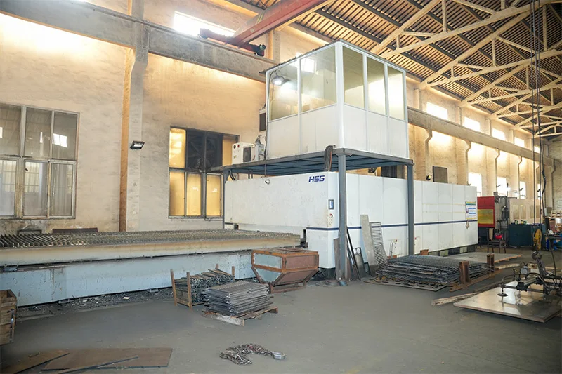 Large cutting and machining equipment inside the workshop