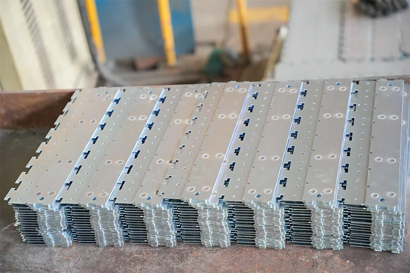 Stacked stamped steel components ready for welding